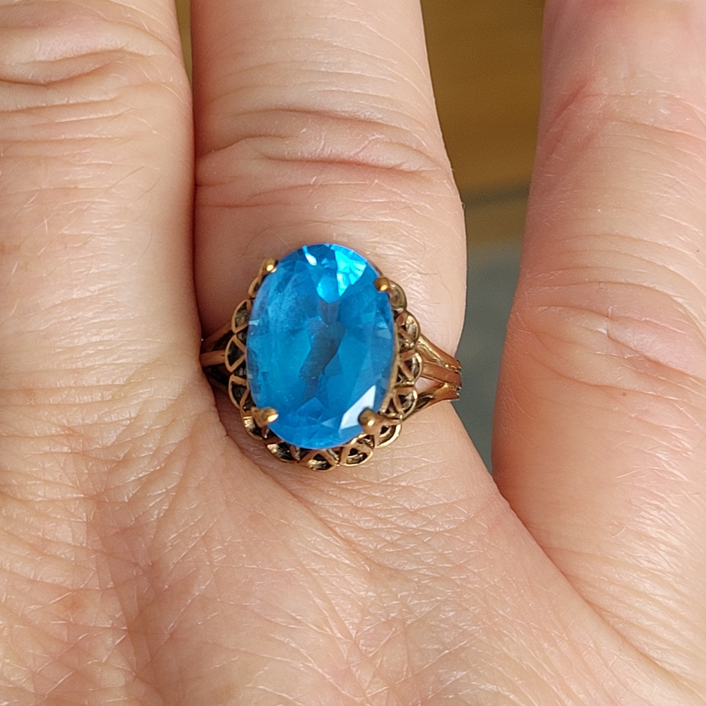 Gold Filigree Ring with Bright Blue Oval Stone
